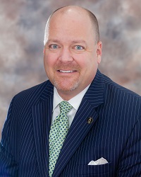 Edward J. Tessman - Executive Director